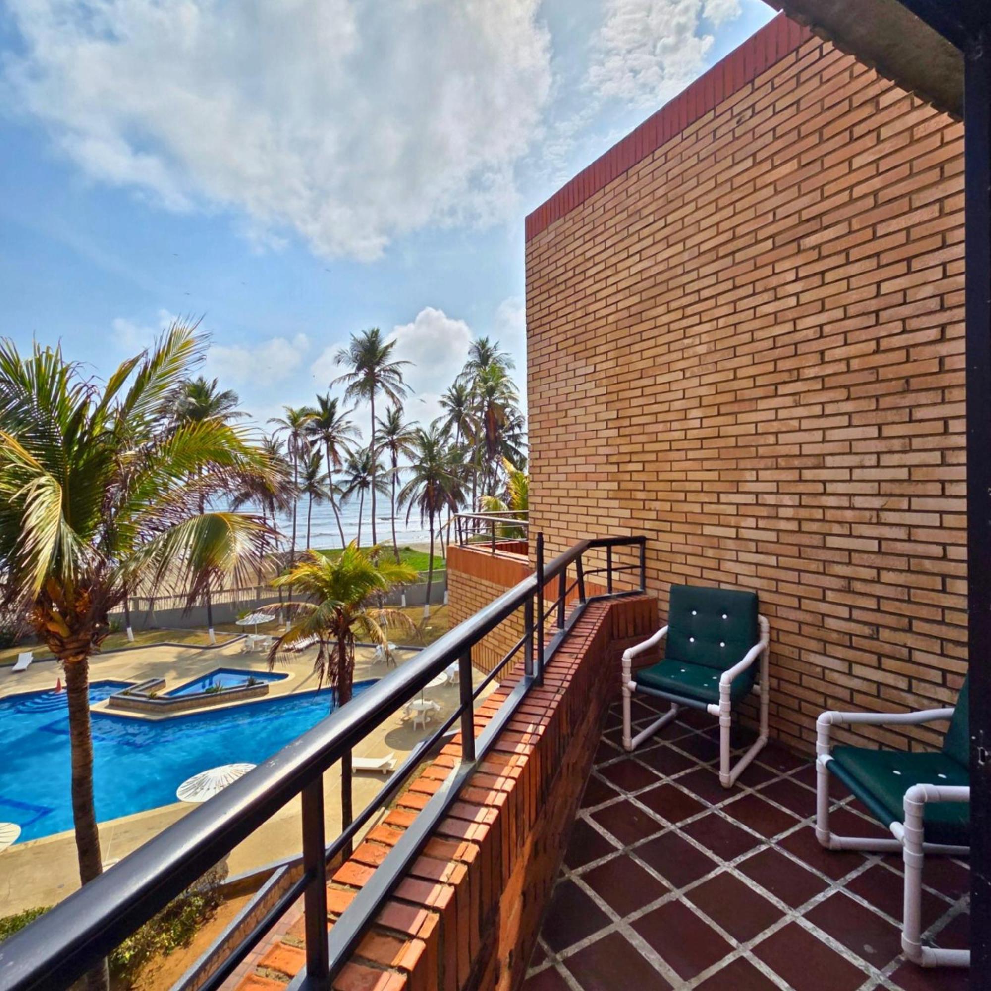 Апартаменты Tucacas, Frente Al Mar, Balcon, Piscina Y Playa Privada Экстерьер фото